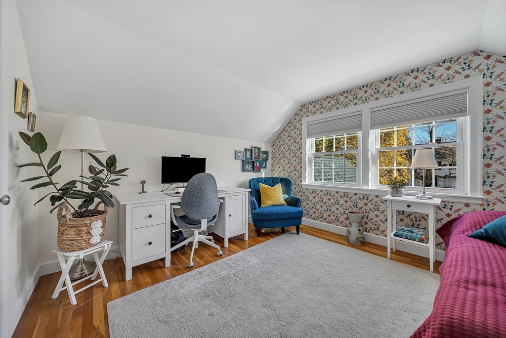 14 Twitchell Street Wellesley, MA 02482 - Photo 21 of 37 a bedroom with furniture and a large window