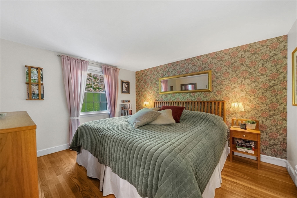 14 Twitchell Street Wellesley, MA 02482 - Photo 23 of 37 a bedroom with a bed wooden floor and window