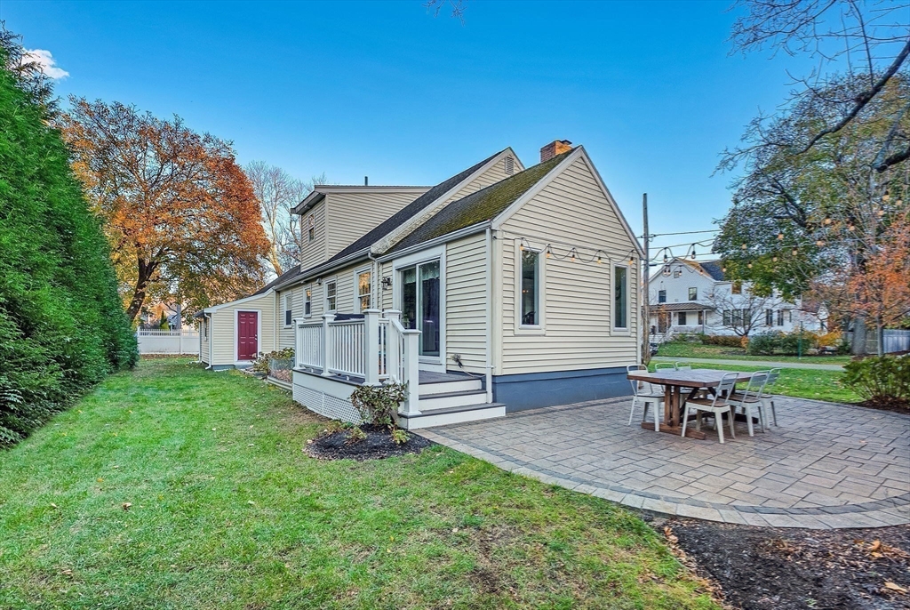 14 Twitchell Street Wellesley, MA 02482 - Photo 36 of 37 a backyard of a house with table and chairs