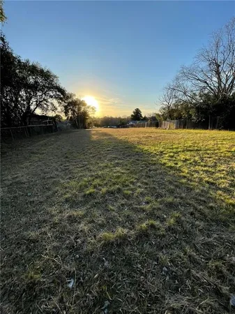 a view of an ocean with a yard
