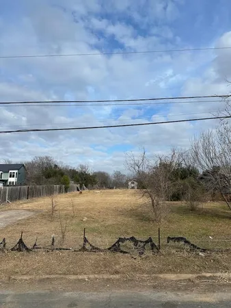 a view of a lake from a yard