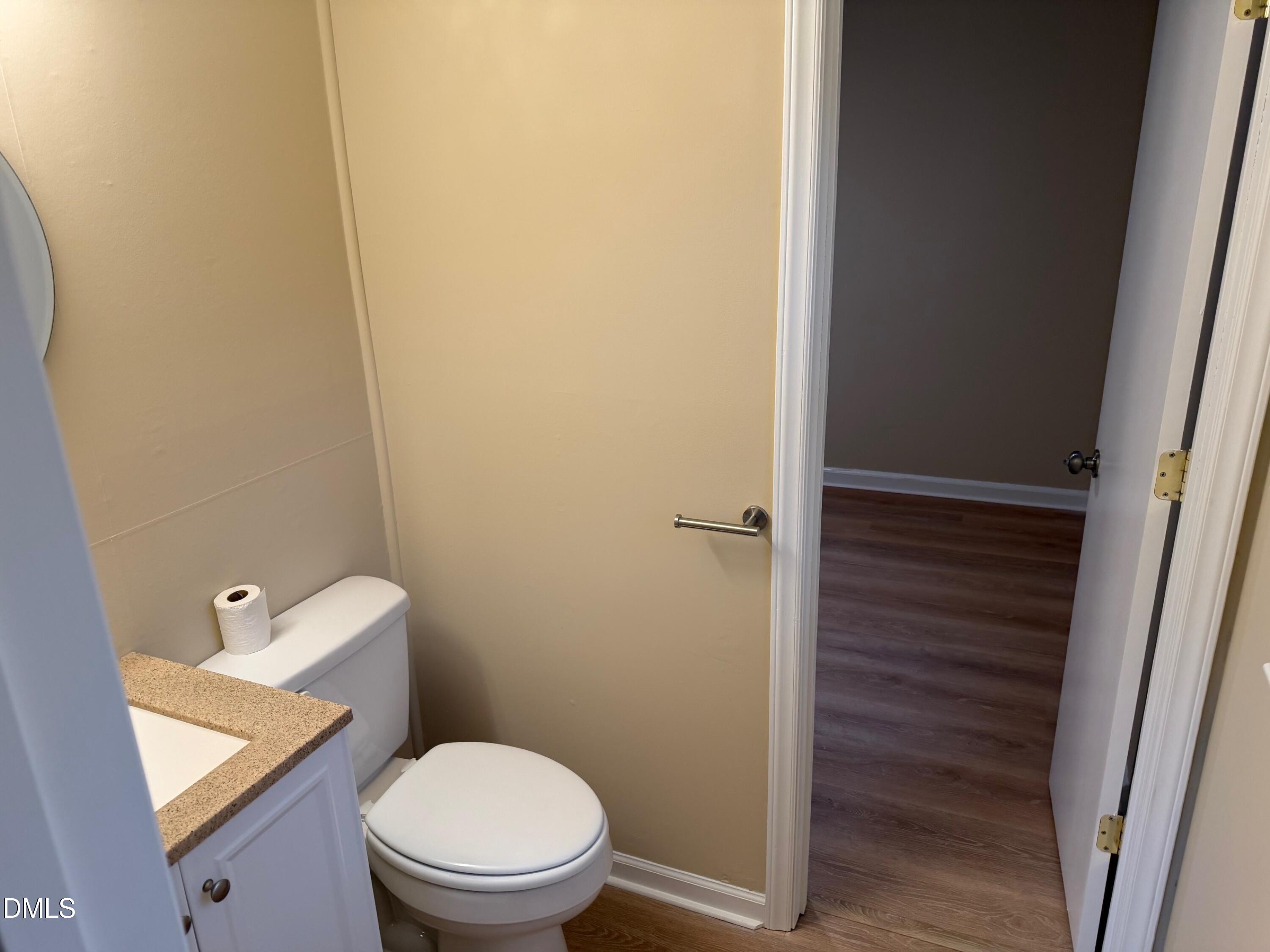 3117 Tryon Road Raleigh, NC 27603 - Photo 14 of 21 a white toilet sitting next to a shower