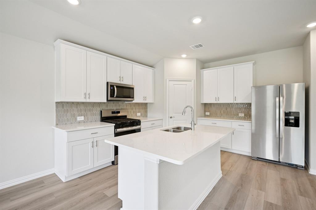 Photo is not of the actual home, but is an inspirational photo of builder’s model home and may depict options, furnishings, and/or decorator features that are not included.