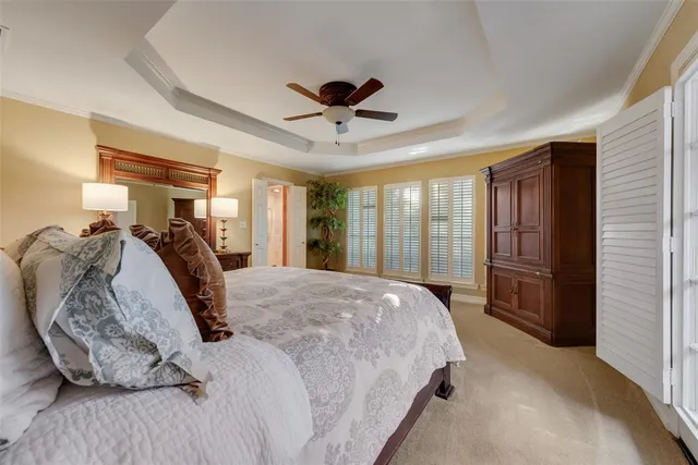 a bed room with a bed and a walk in closet