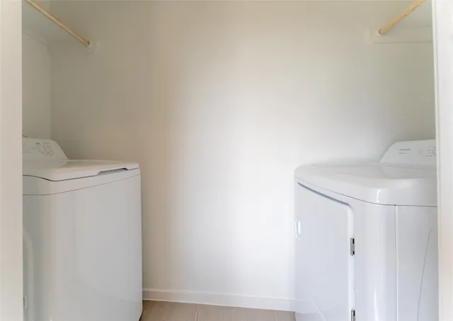a bathroom with a shower and toilet