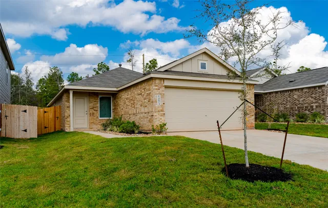 a house view with a garden space