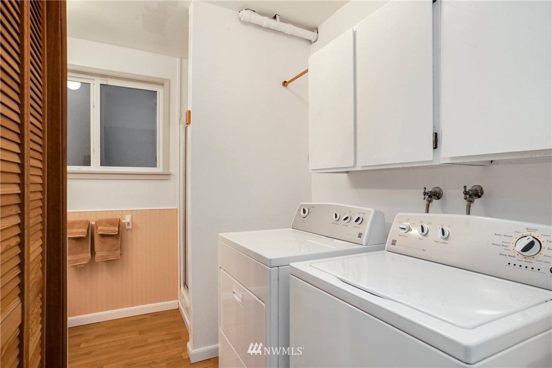 10727 126th Avenue Northeast Kirkland, WA 98033 - Photo 26 of 40 a view of storage and utility room with washer and dryer