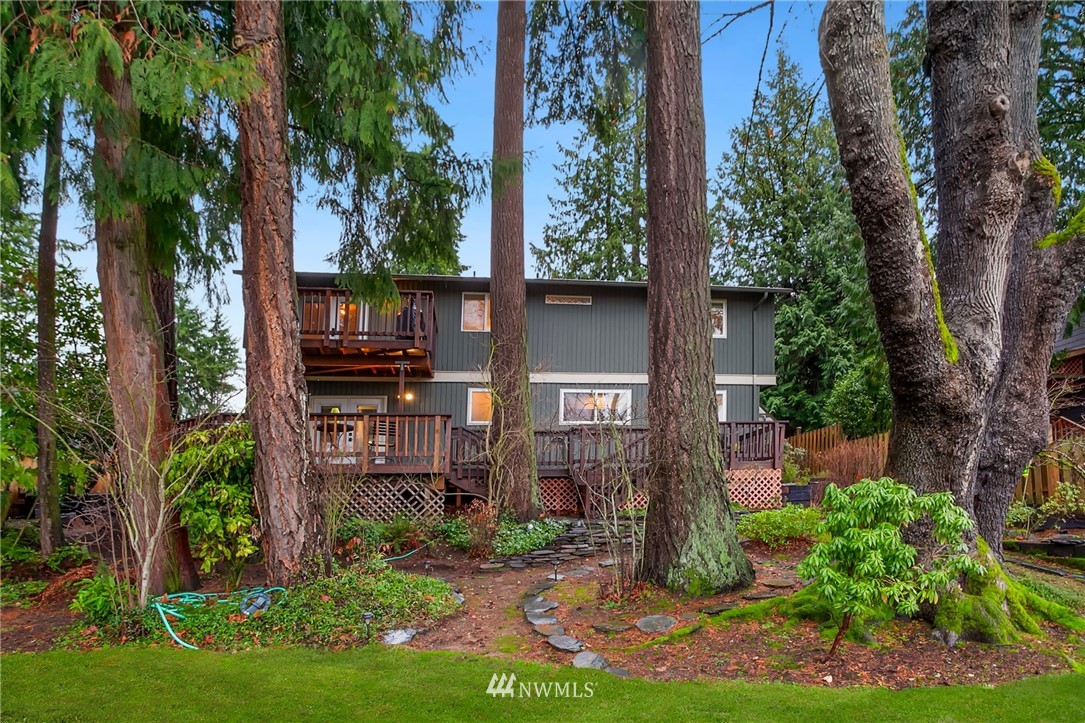 10727 126th Avenue Northeast Kirkland, WA 98033 - Photo 34 of 40 a view of a chairs and table in a backyard