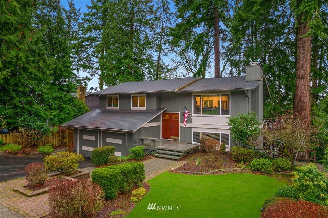 10727 126th Avenue Northeast Kirkland, WA 98033 - Photo 36 of 40 a front view of a house with a yard