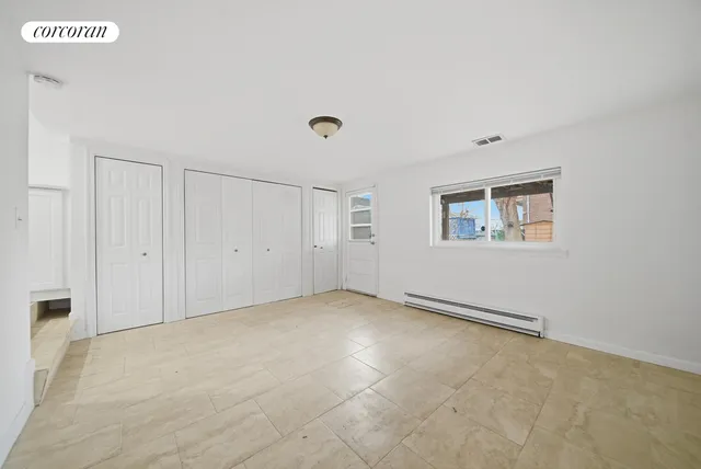 an empty room with windows