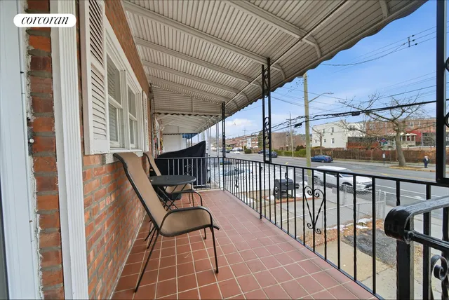 a view of balcony with furniture