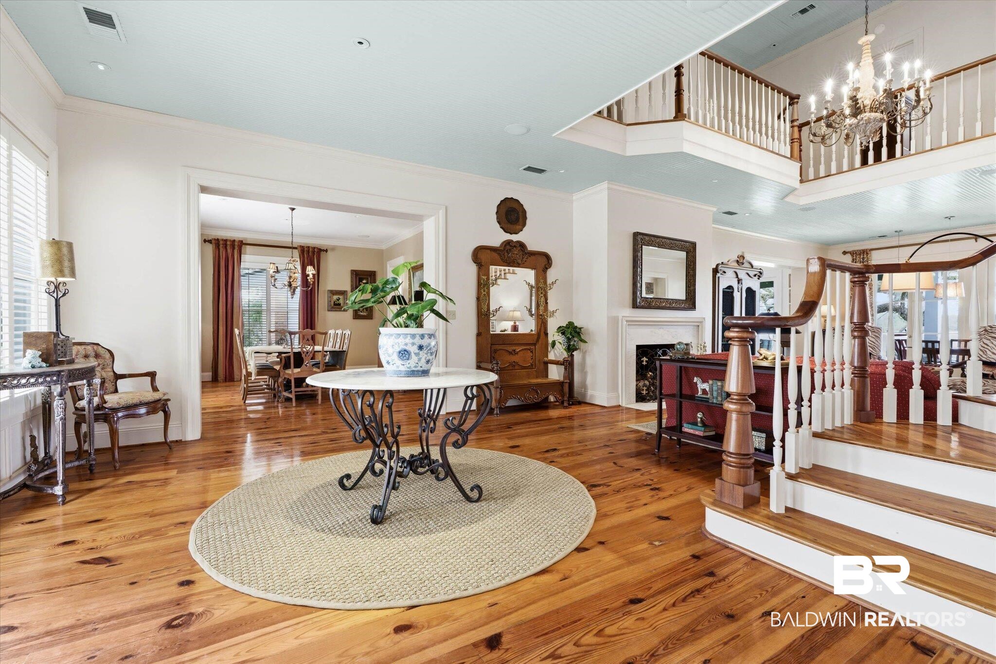 3500 Higgins Road Mobile, AL 36619 - Photo 4 of 54 Foyer entrance featuring suspended lighting, hardwood / wood-style flooring, a fireplace, and ornamental molding