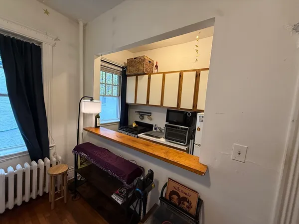 a room with furniture and flat screen tv