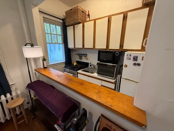a room with furniture and a window