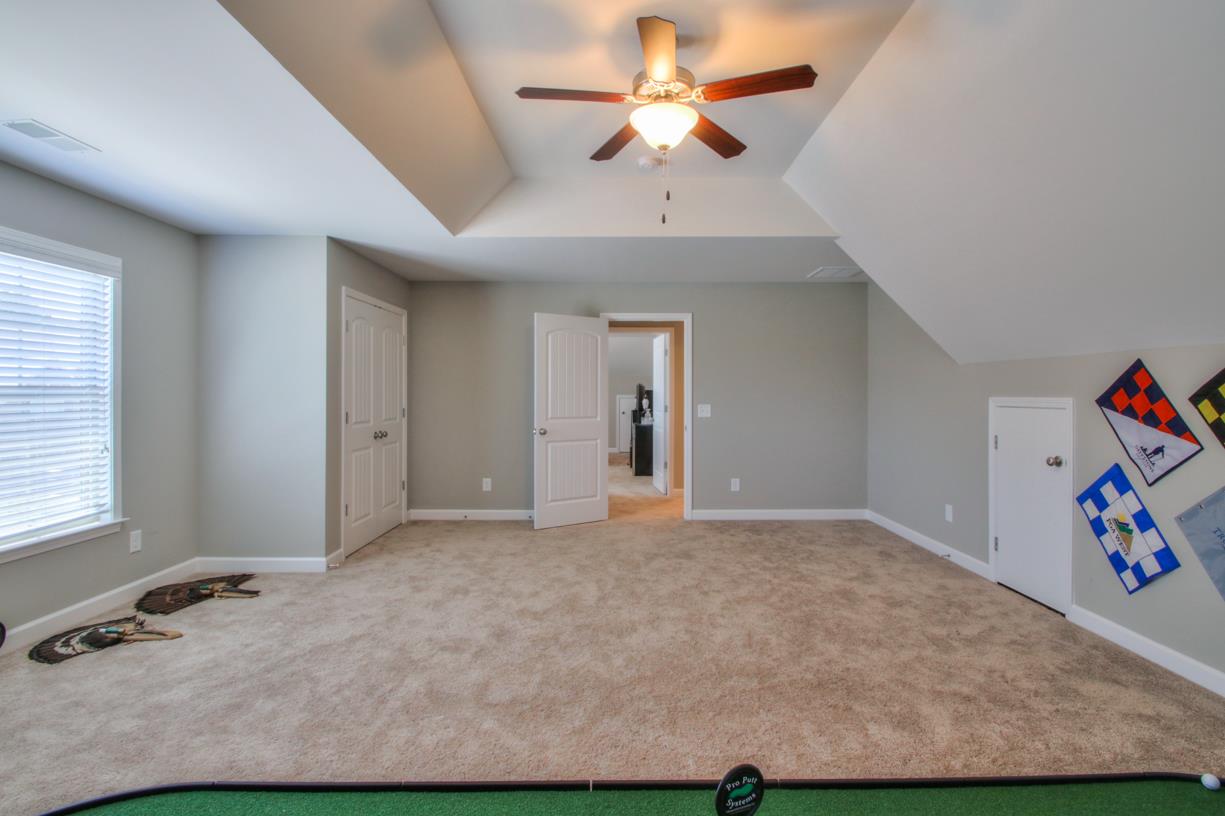 8001 Ragusa Circle Spring Hill, TN 37174 - Photo 25 of 30 Bonus room has a closet so it could be used as 5th bedroom if needed! Small door is extra storage!