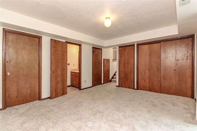 a view of a room with a large window