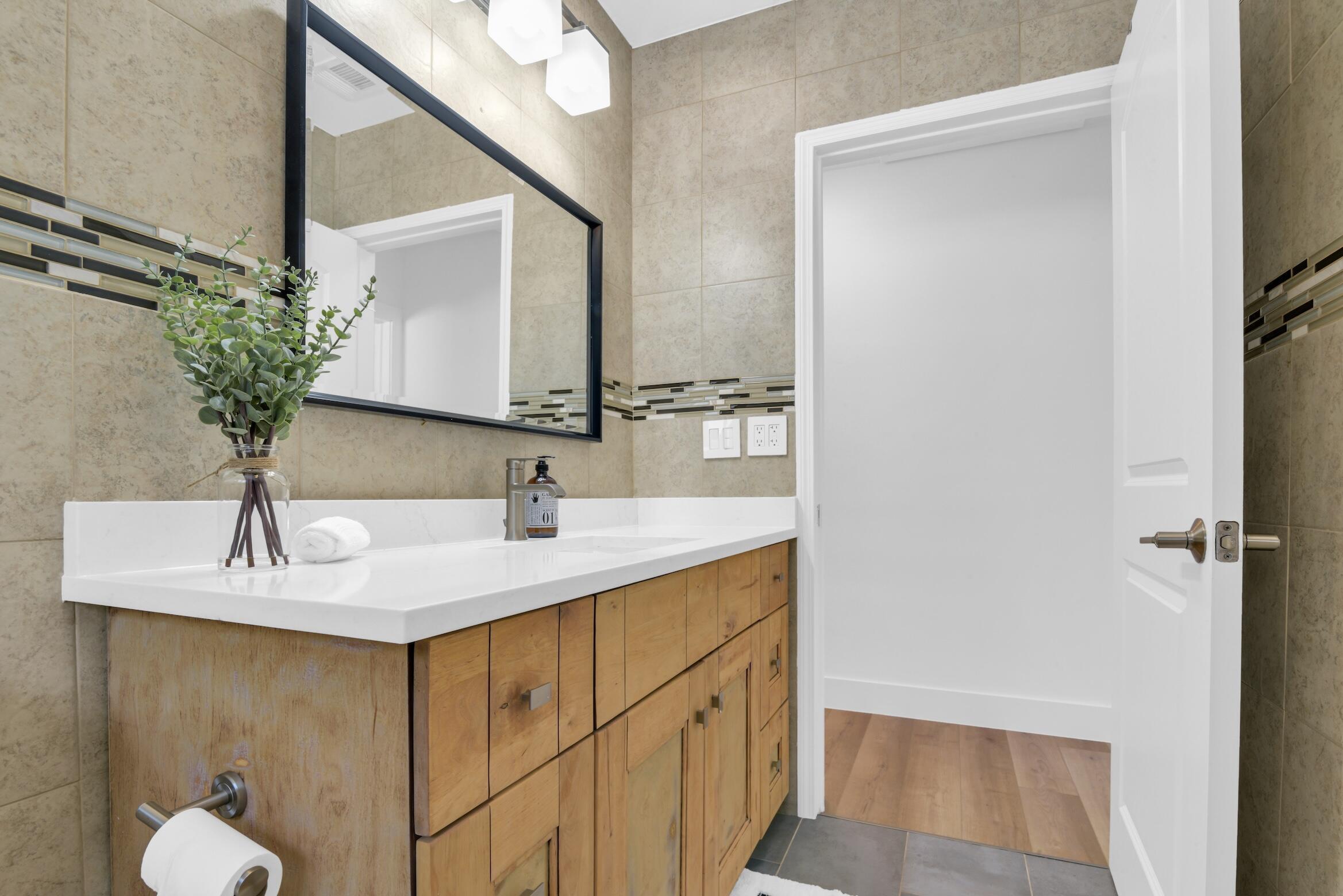 701 Appleby Street Boca Raton, FL 33487 - Photo 36 of 47 a bathroom with a sink and a mirror