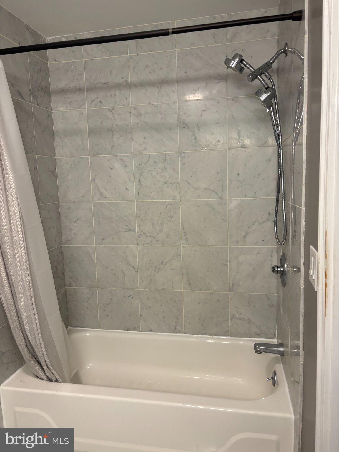 1500 Chestnut Street, Unit 4D Philadelphia, PA 19102 - Photo 23 of 26 Modern bathroom with sleek finishes.