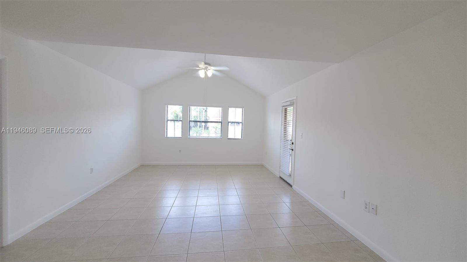 10500 Southwest 155th Court, Unit 1022 Miami, FL 33196 - Photo 11 of 41 a view of an empty room with a window