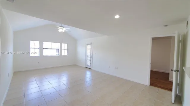 a view of a balcony with furniture