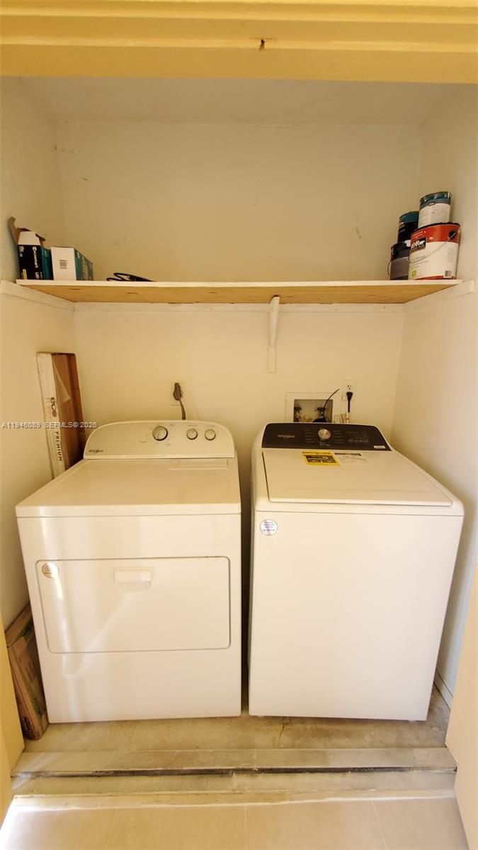 10500 Southwest 155th Court, Unit 1022 Miami, FL 33196 - Photo 35 of 41 a utility room with dryer and washer