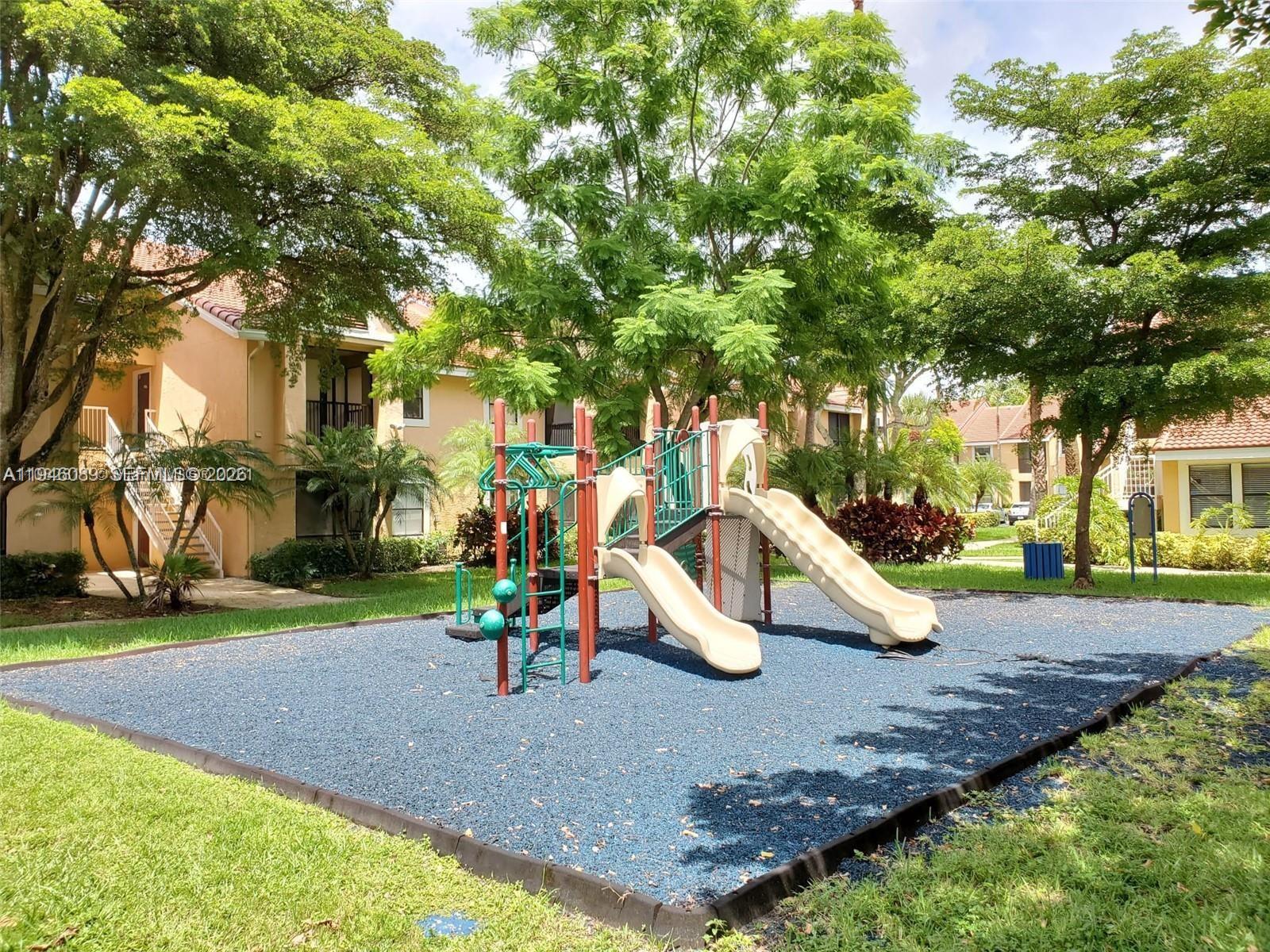 10500 Southwest 155th Court, Unit 1022 Miami, FL 33196 - Photo 41 of 41 a view of a park with slide