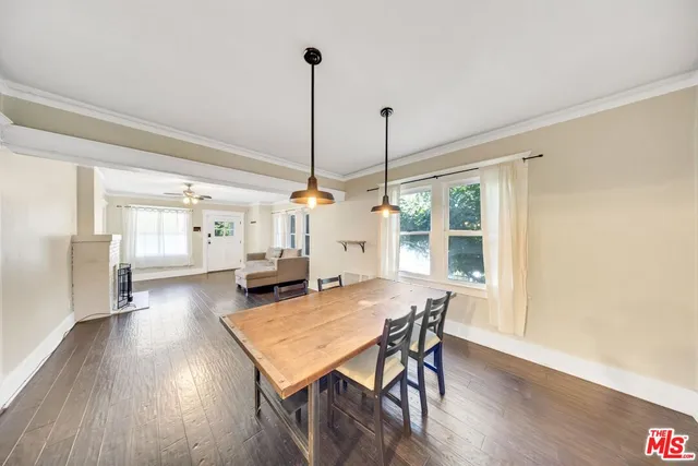 a large kitchen with granite countertop a sink and dishwasher stove