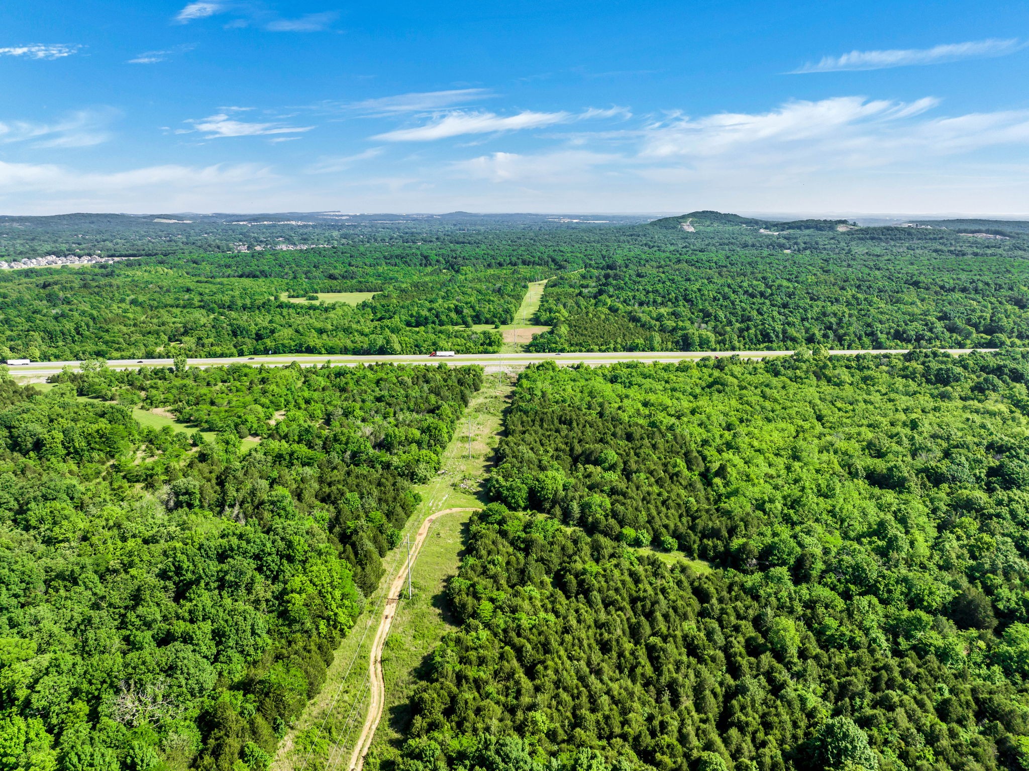 5471 Shores Road Murfreesboro, TN 37128 - Photo 7 of 14 a view of a green field with lots of bushes