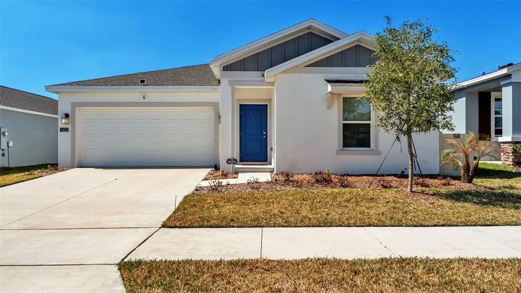 1624 Marksman Road Eagle Lake, FL 33839 - Photo 1 of 42 a front view of a house with garage
