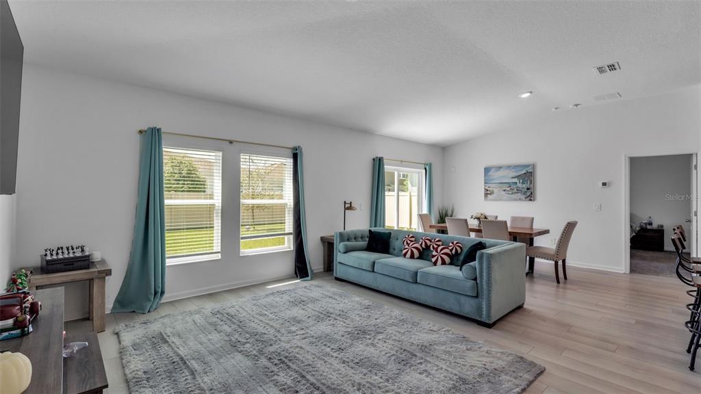 1624 Marksman Road Eagle Lake, FL 33839 - Photo 14 of 42 a living room with furniture and a window