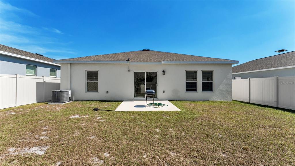 1624 Marksman Road Eagle Lake, FL 33839 - Photo 27 of 42 a house view with a backyard space