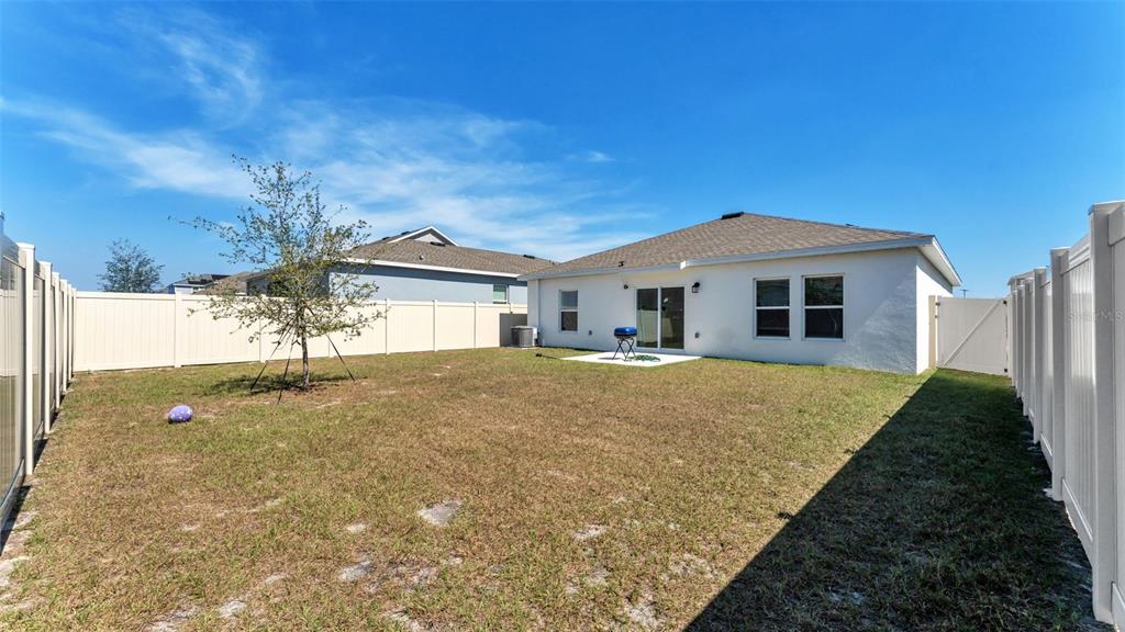 1624 Marksman Road Eagle Lake, FL 33839 - Photo 28 of 42 a front view of a house with a yard