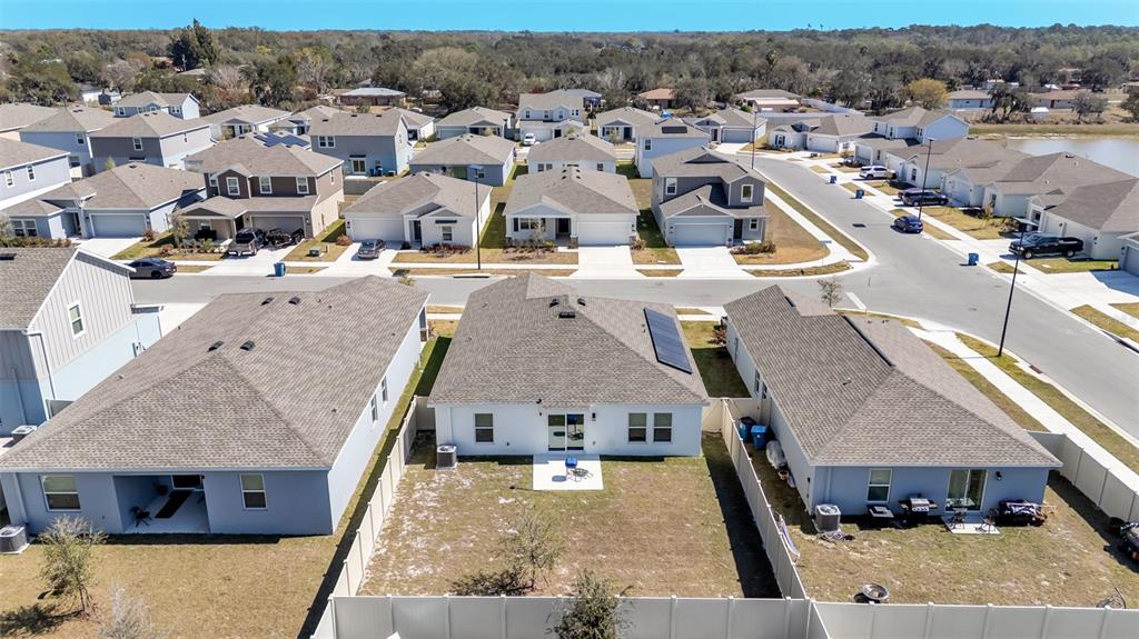 1624 Marksman Road Eagle Lake, FL 33839 - Photo 35 of 42 an aerial view of a house with a yard