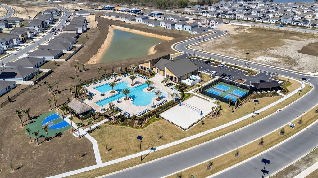 1624 Marksman Road Eagle Lake, FL 33839 - Photo 41 of 42 an aerial view of a residential building and lake view
