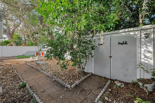 a view of a house with a tree