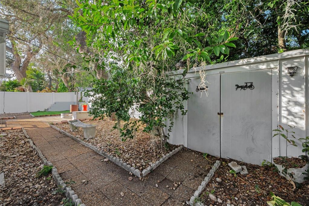 14557 Apache Avenue Largo, FL 33774 - Photo 14 of 51 a view of a house with a tree