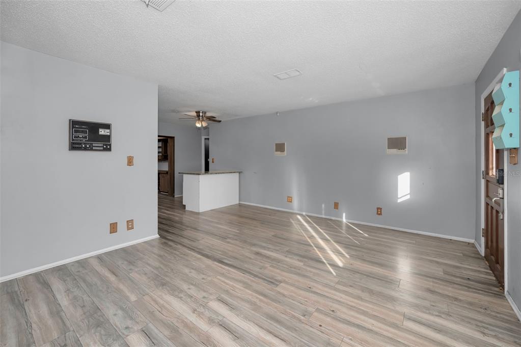 14557 Apache Avenue Largo, FL 33774 - Photo 25 of 50 a view of a room with wooden floor and windows