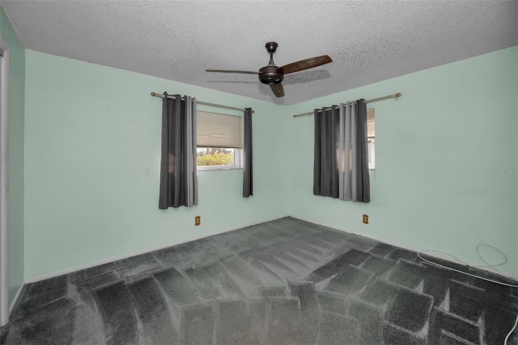 14557 Apache Avenue Largo, FL 33774 - Photo 27 of 50 a view of an empty room with a window