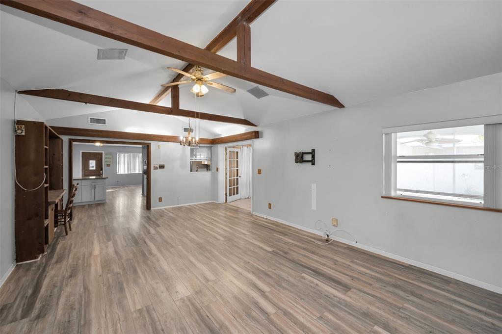 14557 Apache Avenue Largo, FL 33774 - Photo 28 of 51 a view of empty room with wooden floor and fan
