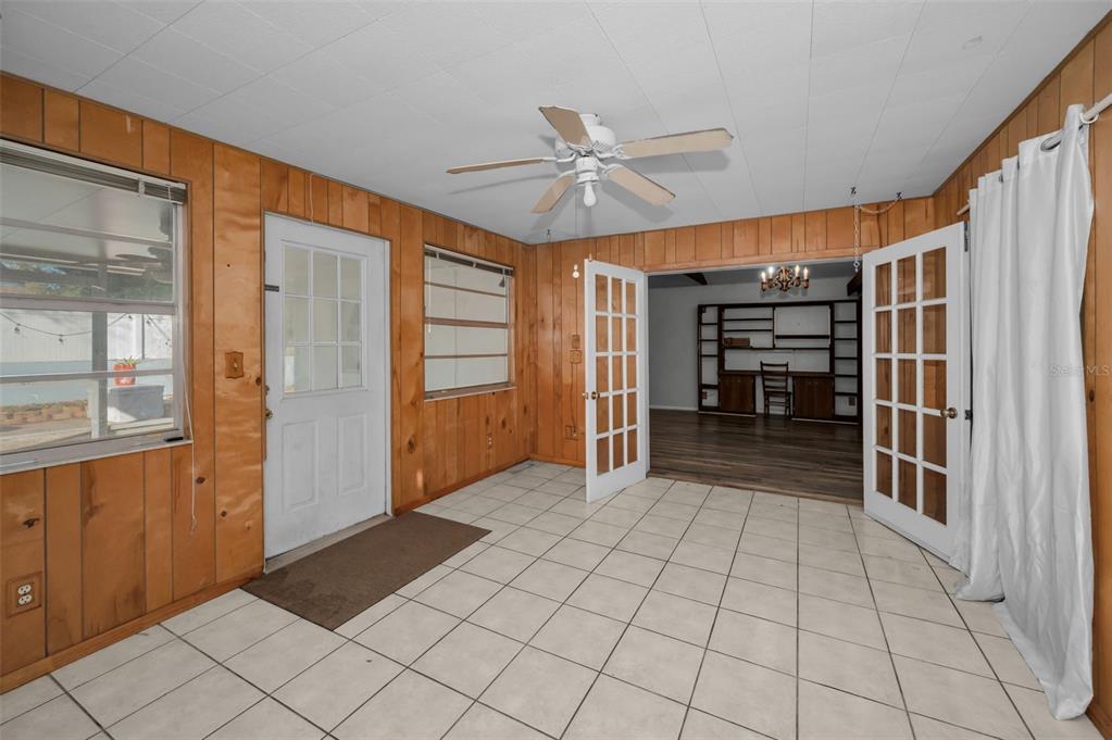 14557 Apache Avenue Largo, FL 33774 - Photo 33 of 50 a view of empty room with wooden floor and window