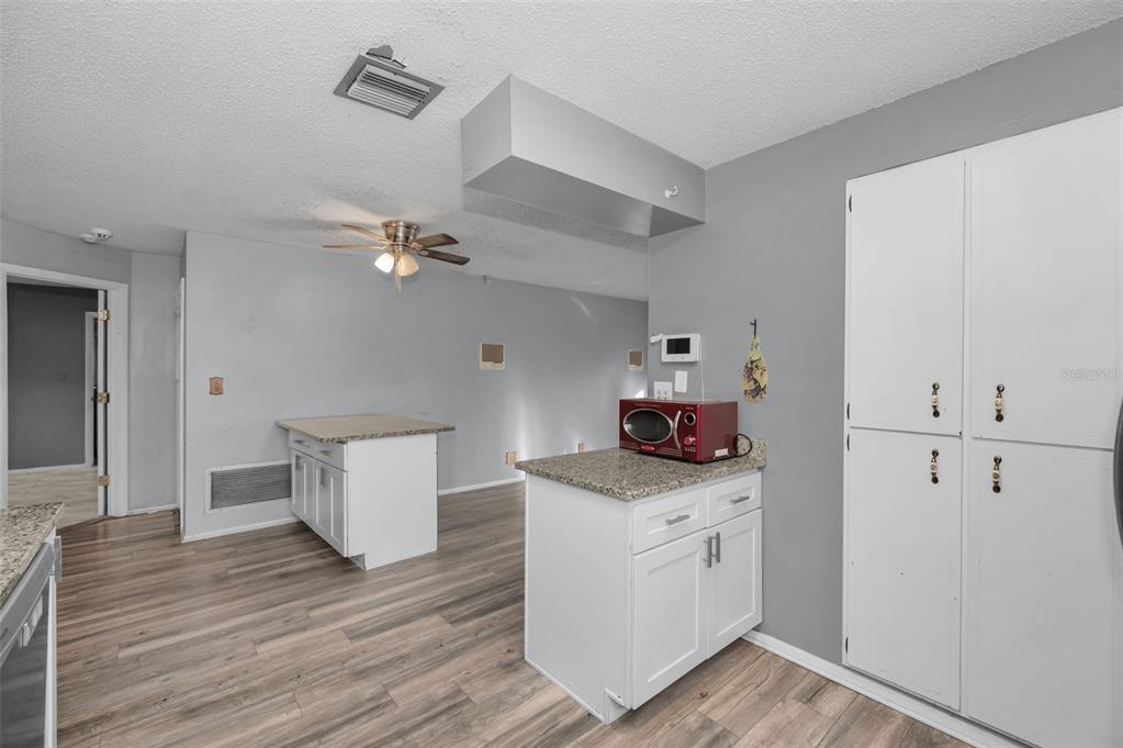 14557 Apache Avenue Largo, FL 33774 - Photo 34 of 51 a very nice looking room with wooden floor