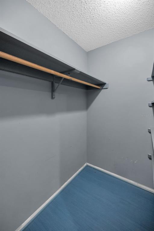14557 Apache Avenue Largo, FL 33774 - Photo 37 of 50 a view of small space with racks on the wall