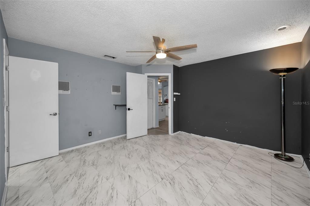 14557 Apache Avenue Largo, FL 33774 - Photo 43 of 51 a view of empty room with ceiling fan