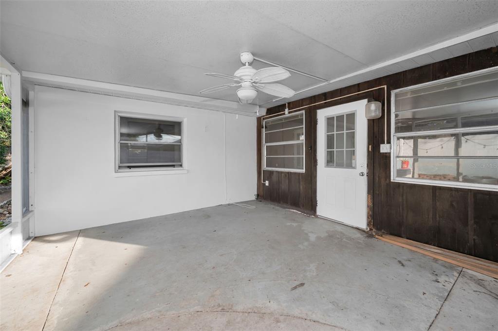 14557 Apache Avenue Largo, FL 33774 - Photo 47 of 51 a view of an empty room with a window