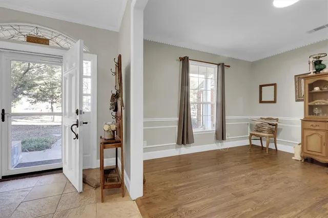 a view of livingroom with furniture and windows