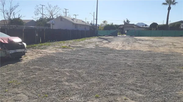 a view of a backyard of the house