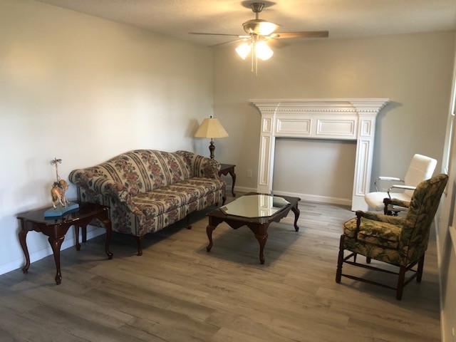 3289 Buffalo Road Ethridge, TN 38456 - Photo 7 of 20 a living room with furniture and a chandelier