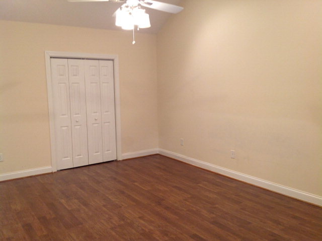 4775 Brookhaven Road Macon, GA 31206 - Photo 5 of 16 a view of an empty room with wooden floor