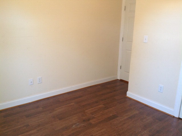 4775 Brookhaven Road Macon, GA 31206 - Photo 8 of 16 a view of an empty room with wooden floor