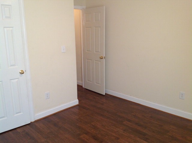 4775 Brookhaven Road Macon, GA 31206 - Photo 10 of 16 a view of an empty room with wooden floor